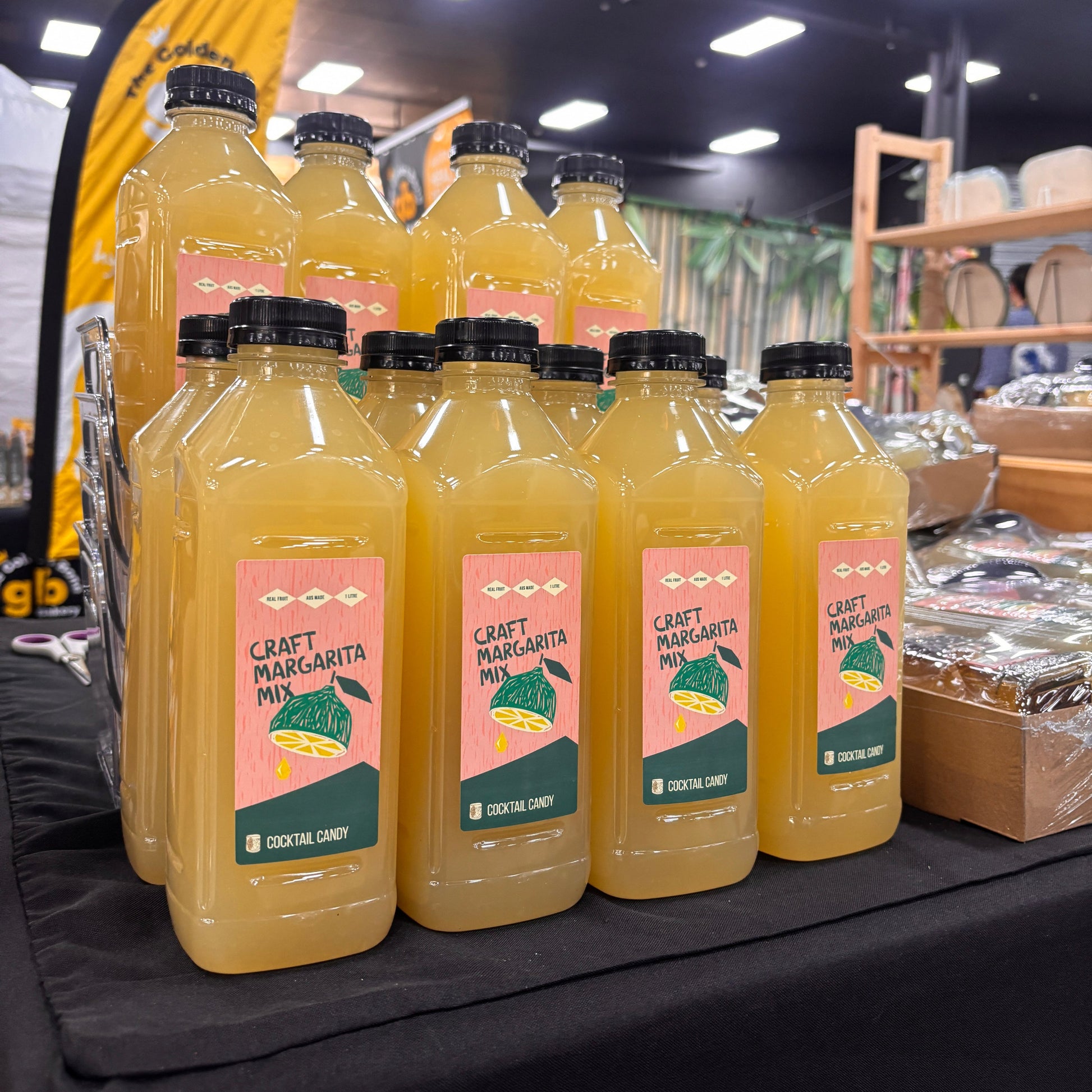 Rows of bottles of a margarita mix 