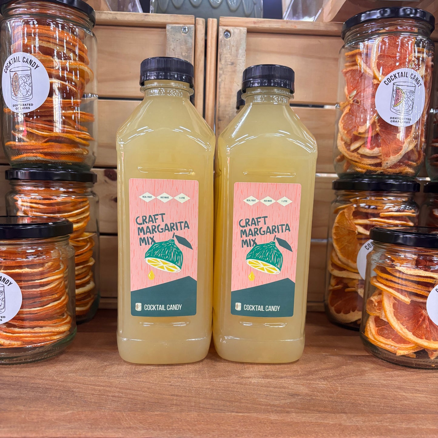 Two bottles of margarita mix